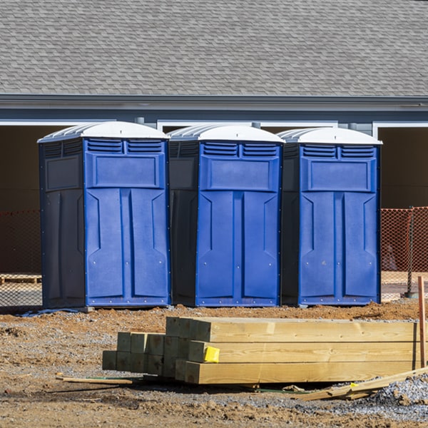 what is the cost difference between standard and deluxe portable toilet rentals in Lindsay NE